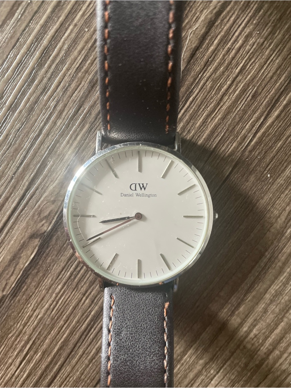 Daniel Wellington Watch — White Dial, Black Strap with Brown Stitching